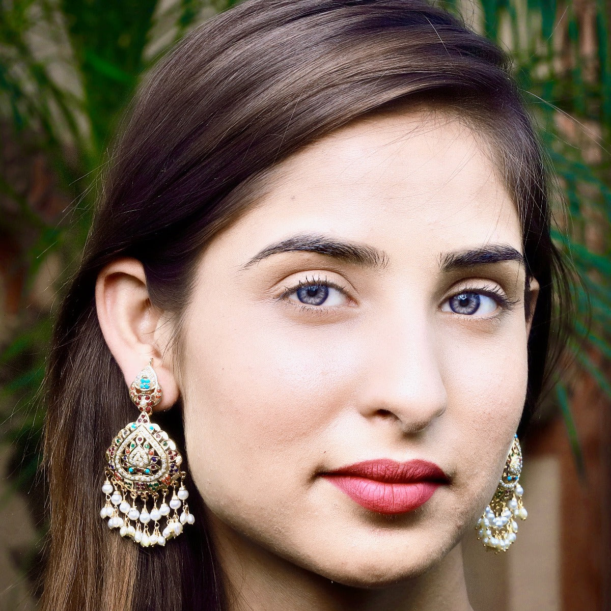 Navratan Stones Studded Jadau Earrings in Gold Plated Silver ER 177