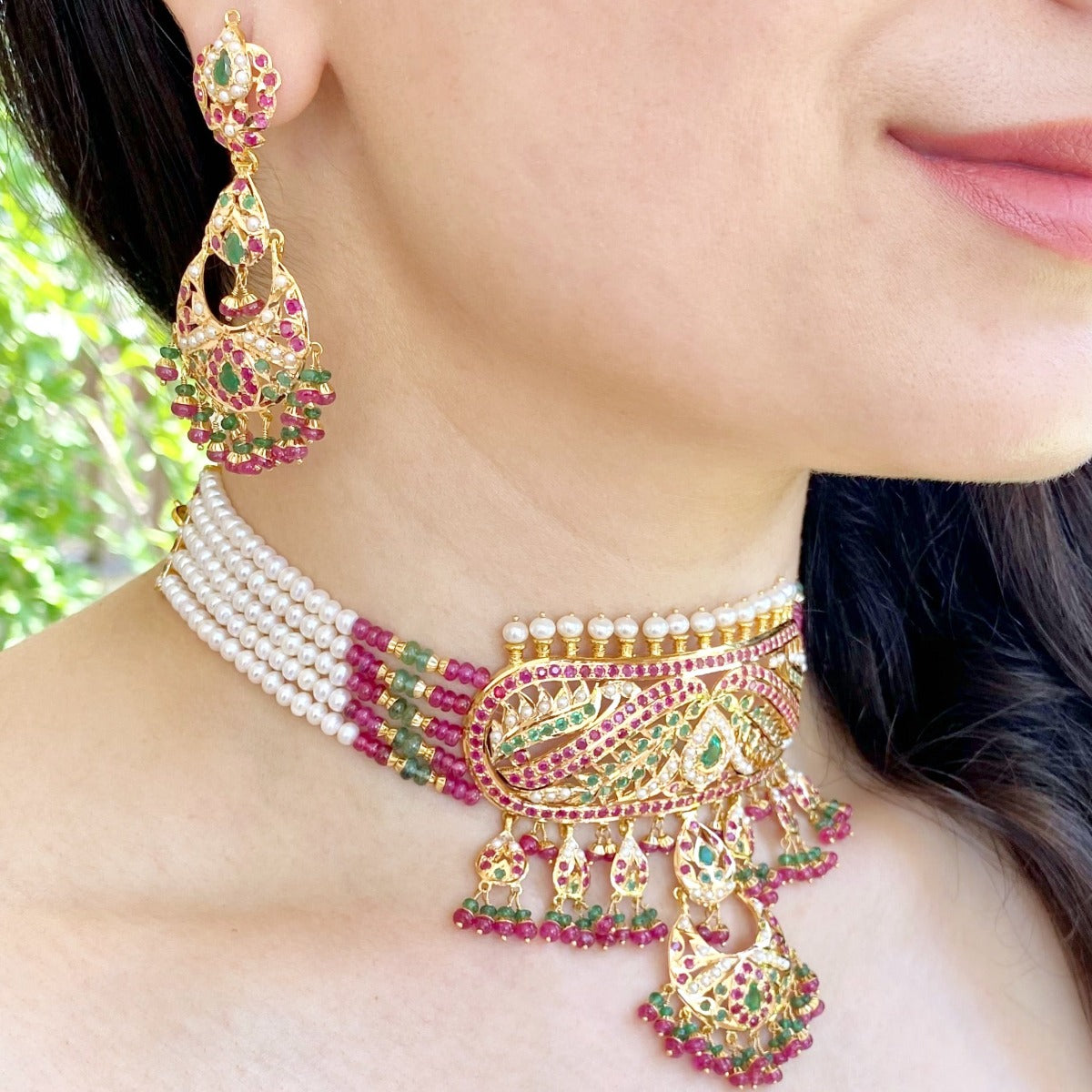 real gold jadau set with precious stones