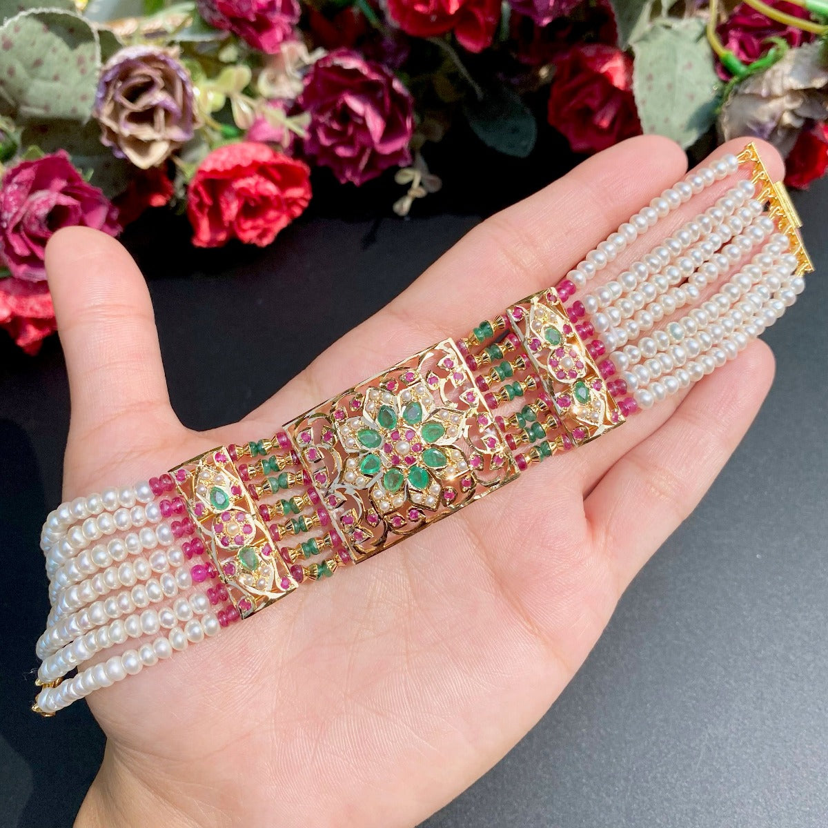 jadau dasti on gold with ruby emerald and pearls