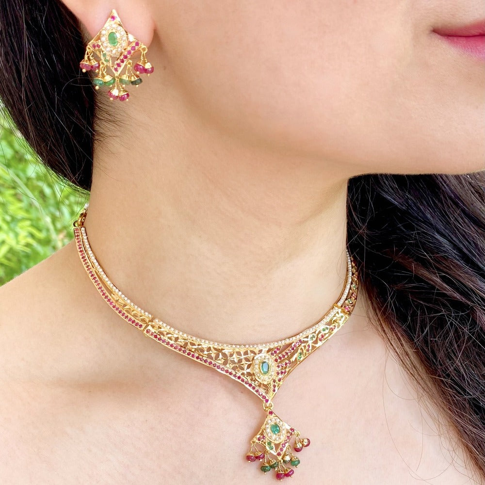 delicate jadau set with ruby emerald and pearls