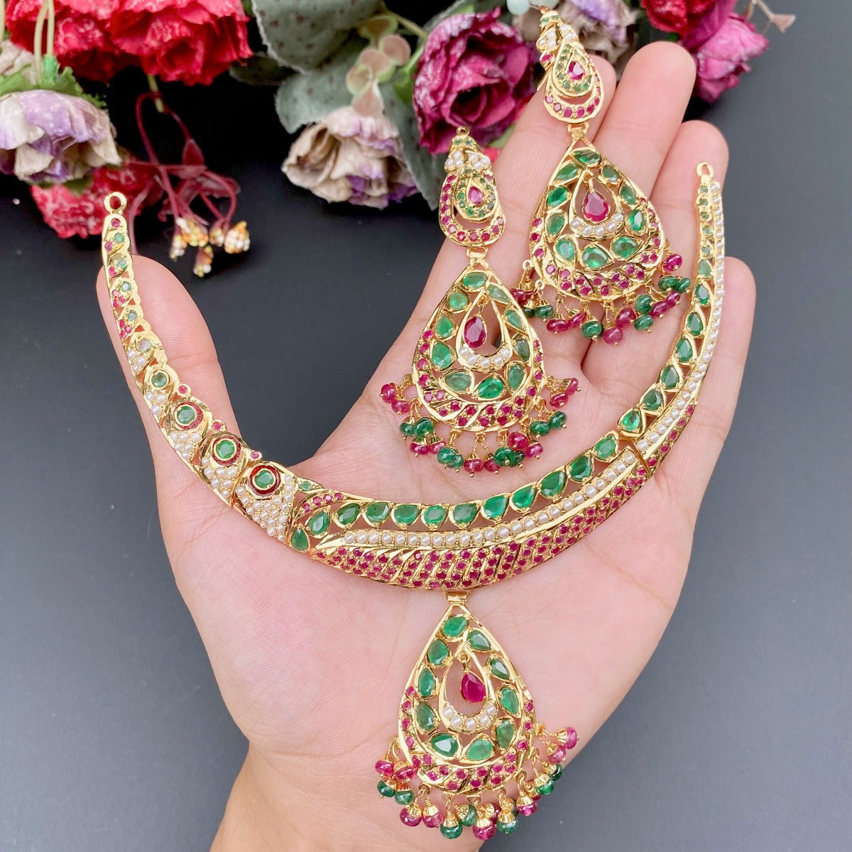 ruby emerald hasli set in gold