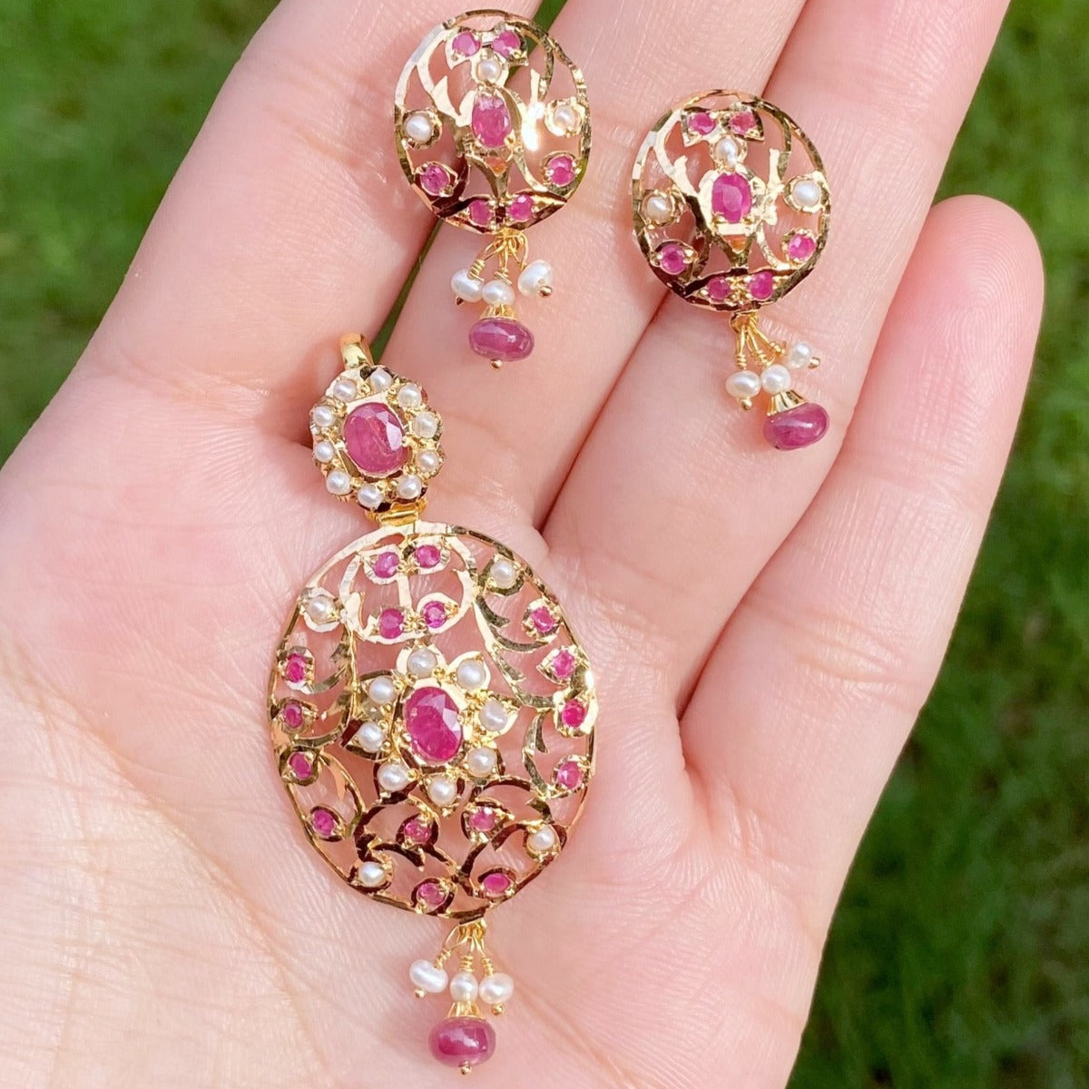ruby and pearl pendant set in 22 carat gold