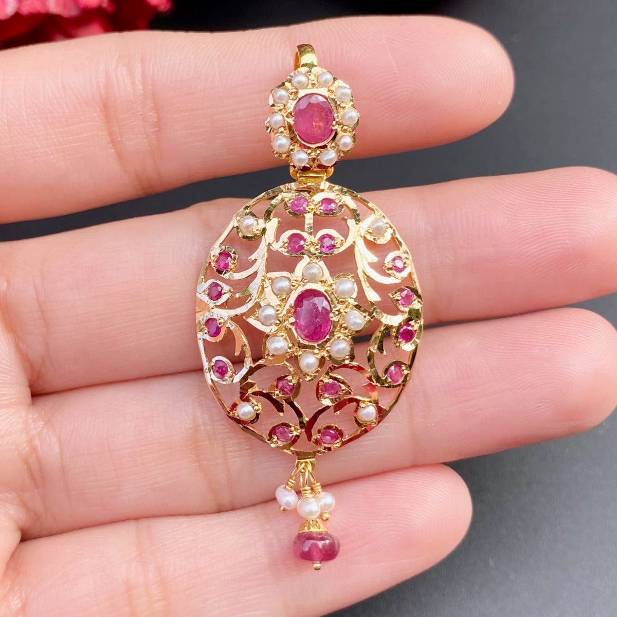 ruby and pearl pendant set in 22 carat gold