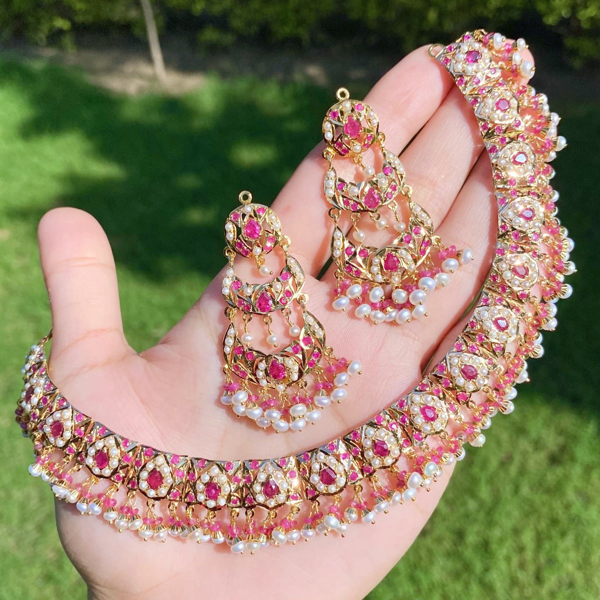 ruby and pearl jadau set three tier earrings
