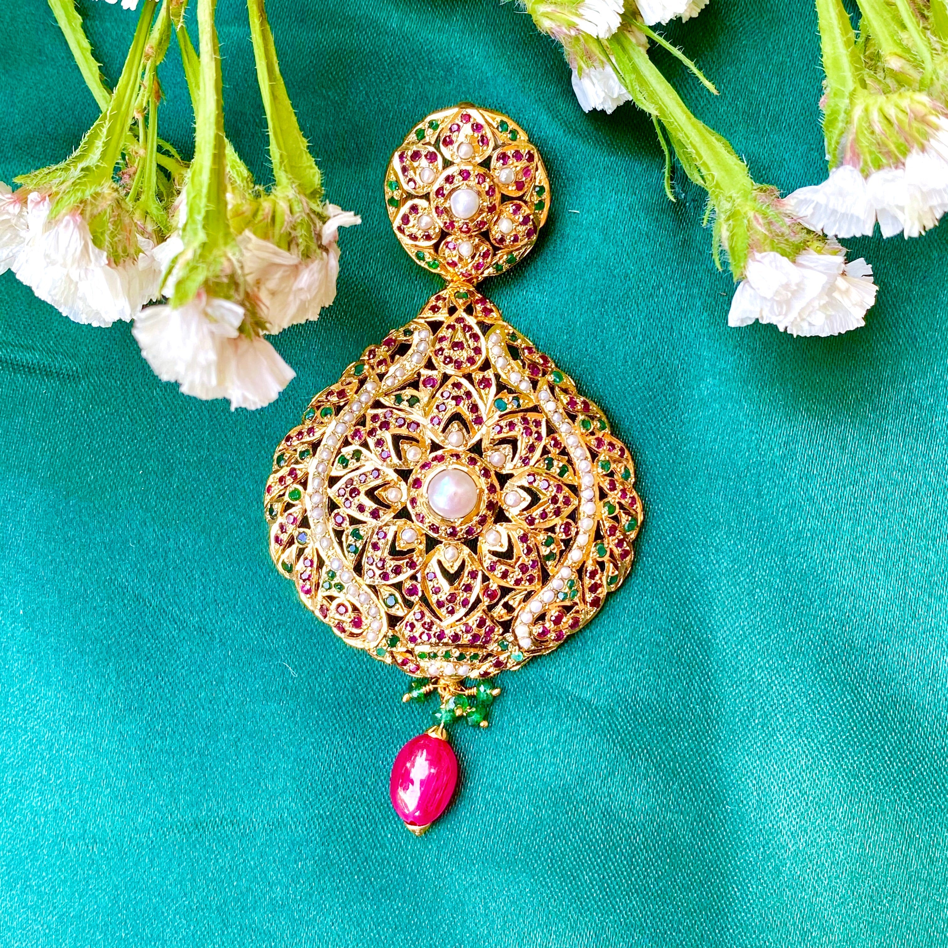 ruby emerald pendant set on silver with gold plating