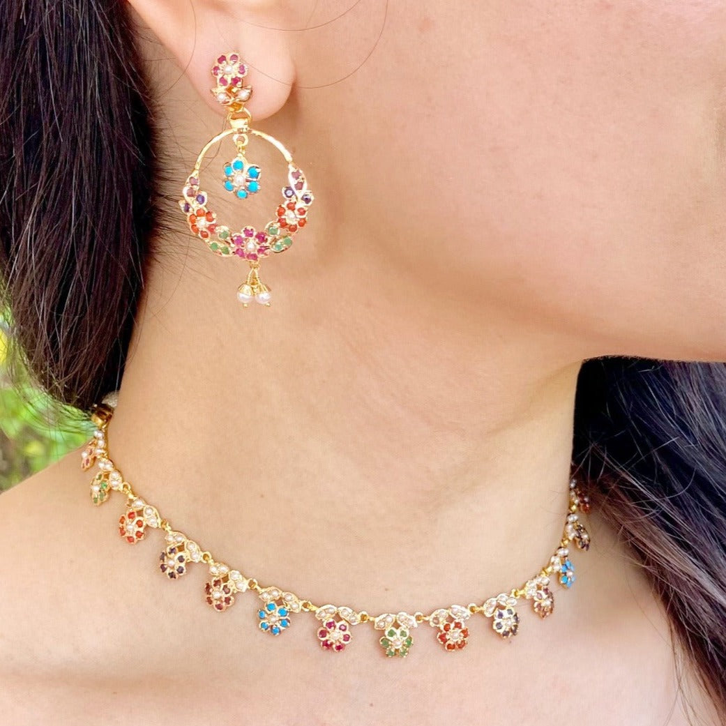 sober and simple gold set with navratna