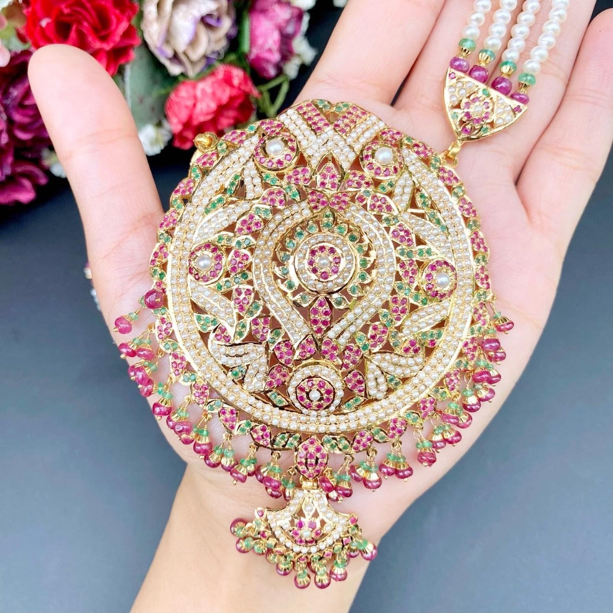 round gold rani haar with precious ruby emeralds