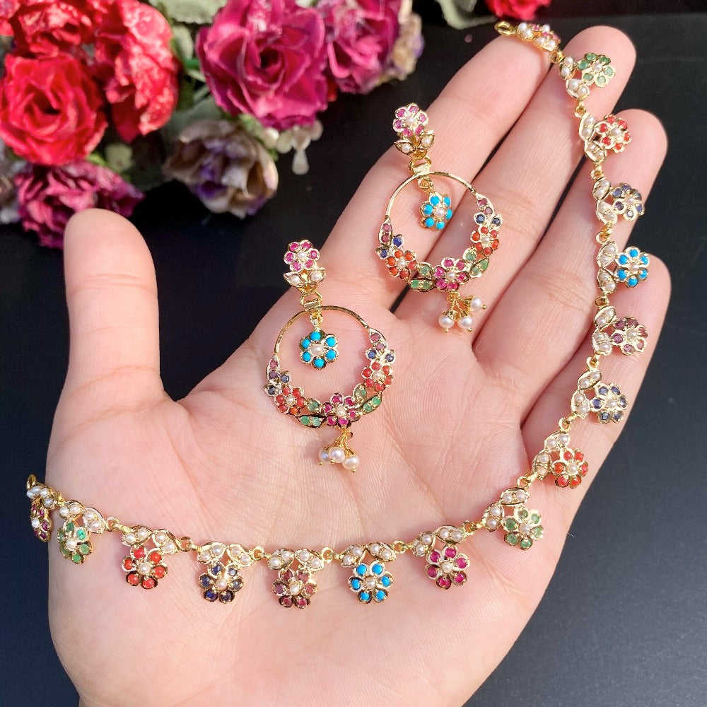 sober and simple gold set with navratna