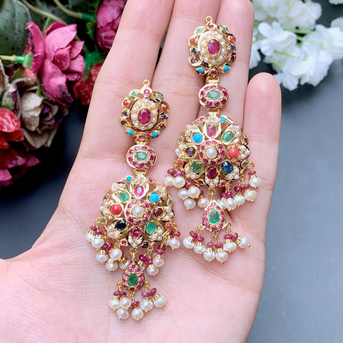 long gold danglers with navratna stones