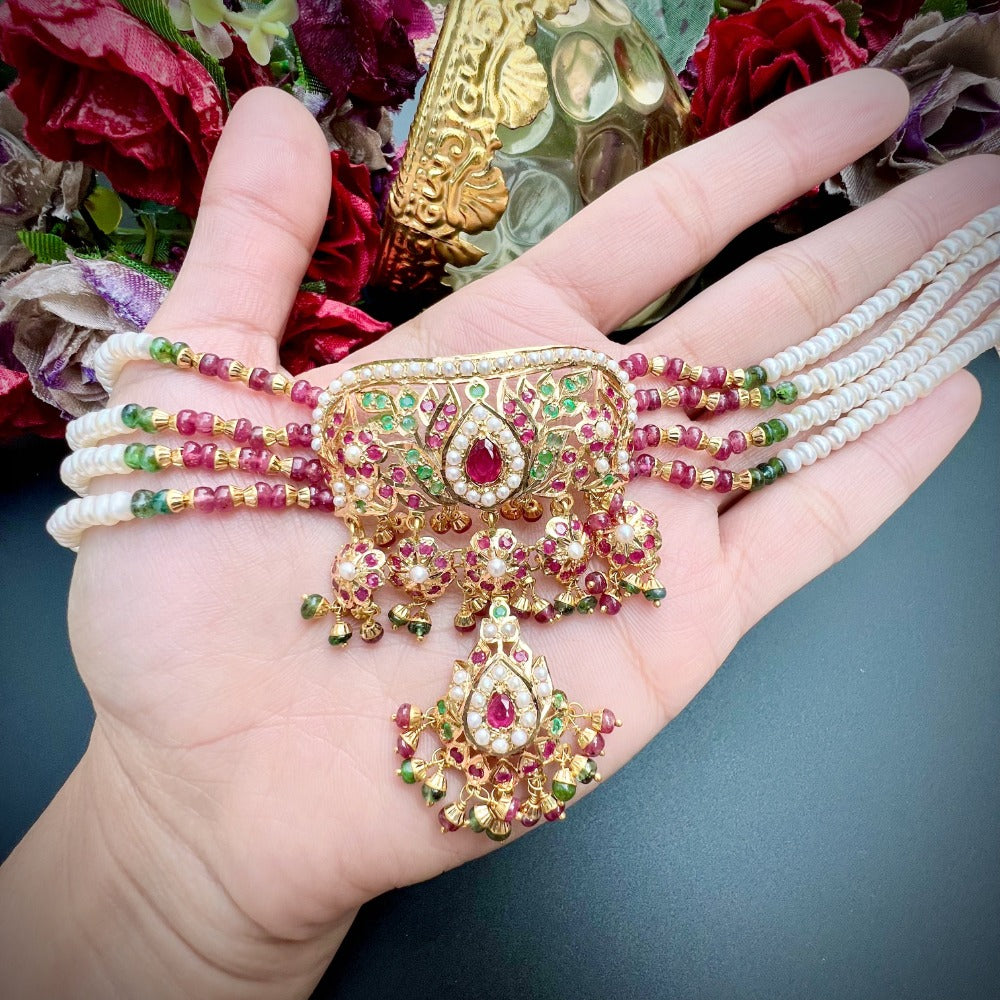 ethnic indian gold choker with ruby emerald stones