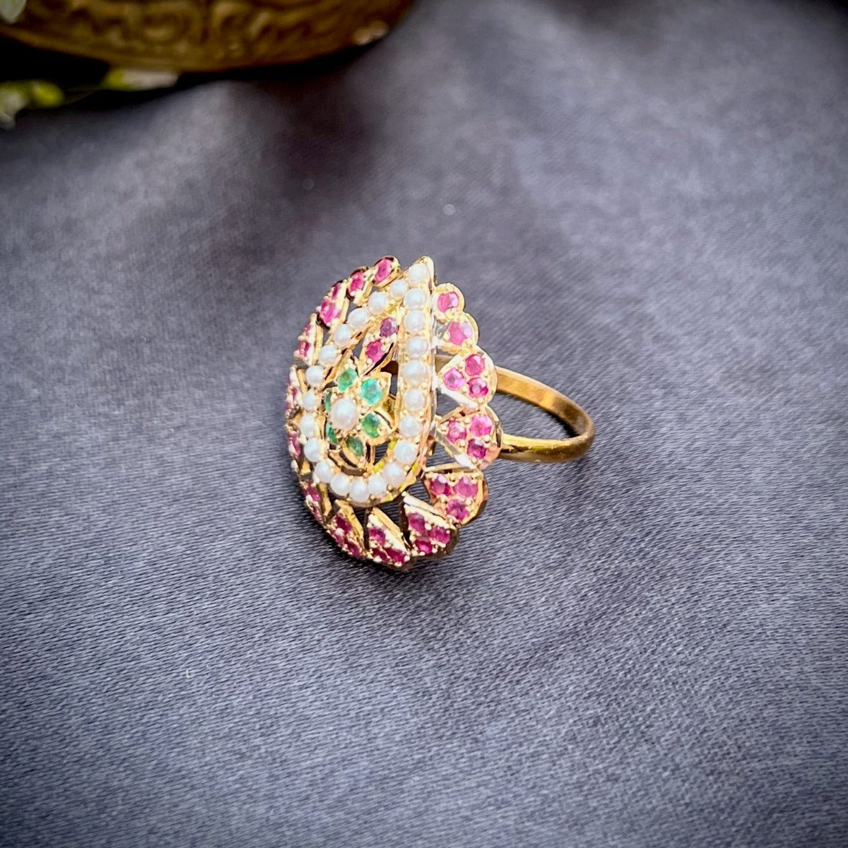 real gold jadau ring with real rubies and emerald