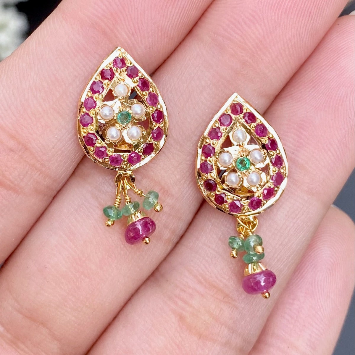 multicolor studs in gold