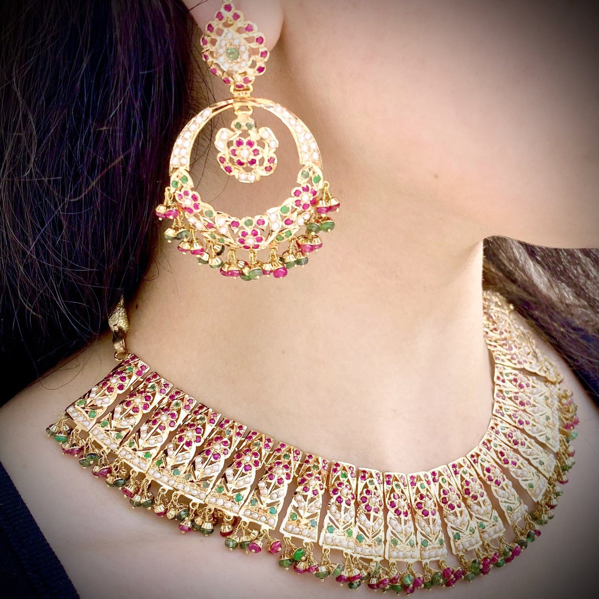 bridal jadau gold set adorned with rubies emeralds pearls