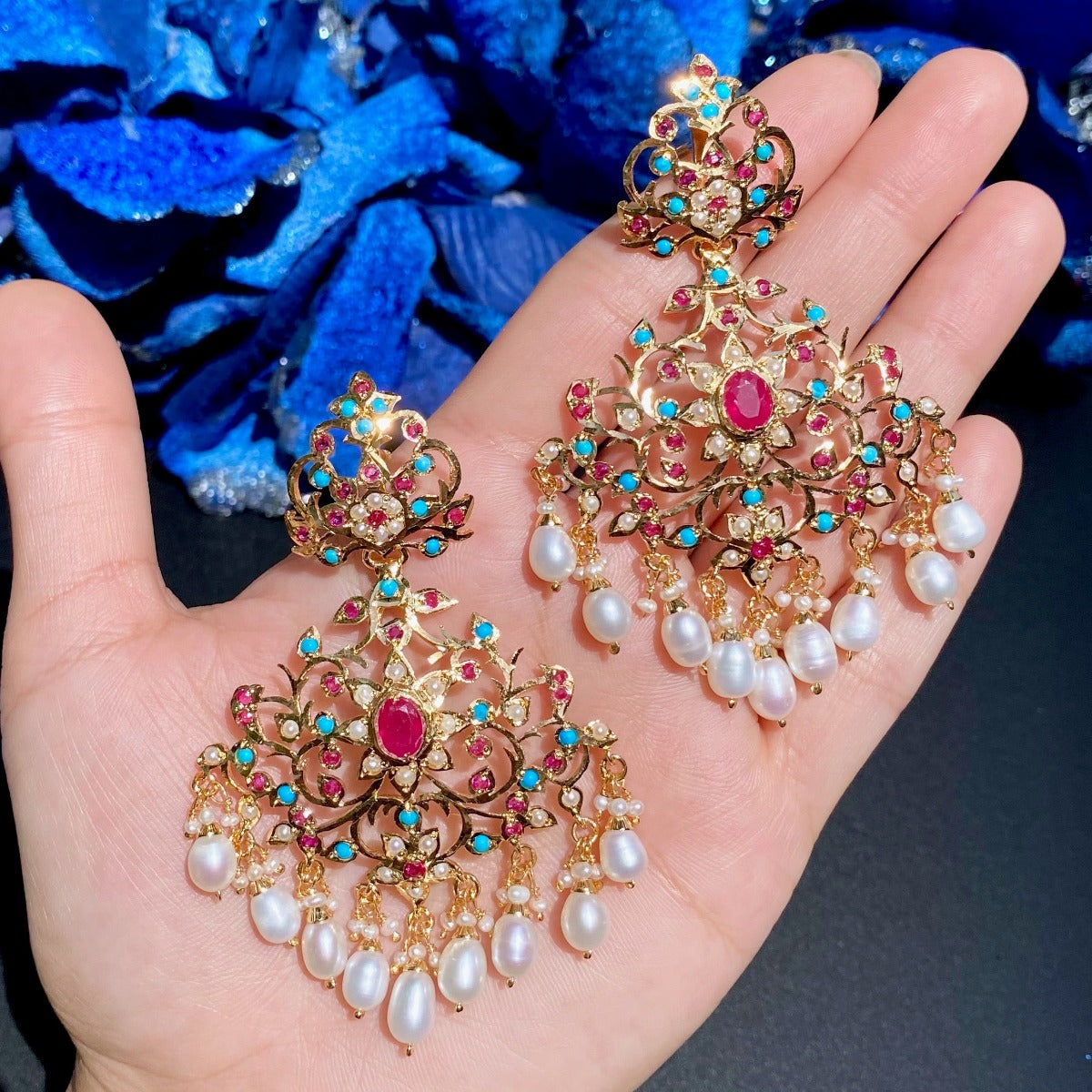 statement jadau earrings with ruby and pheroza