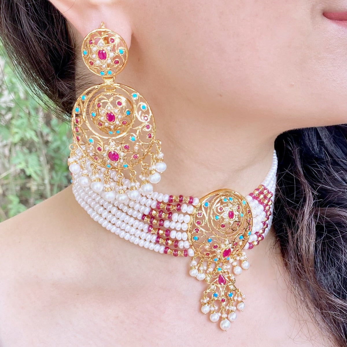 gold plated jadau choker and earrings