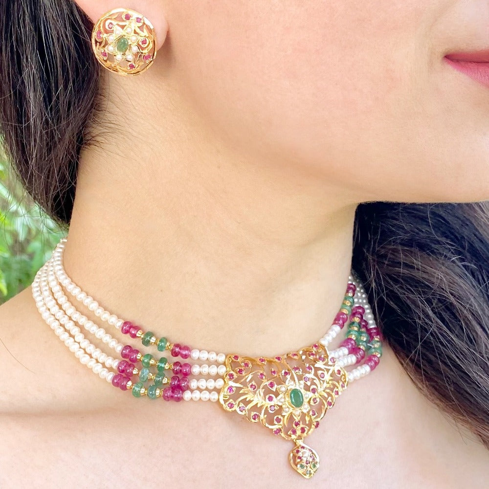 sober gold choker with ruby emerald