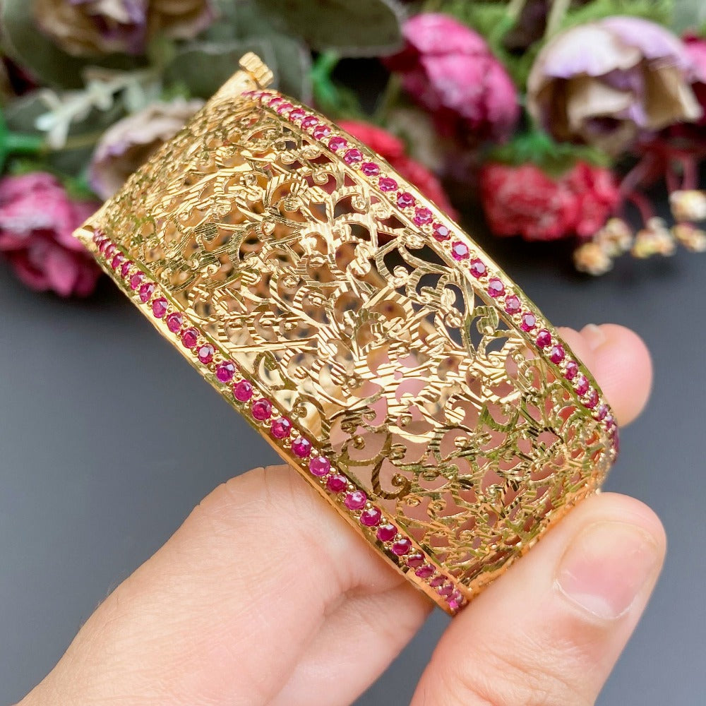 ruby bangle in gold polished silver