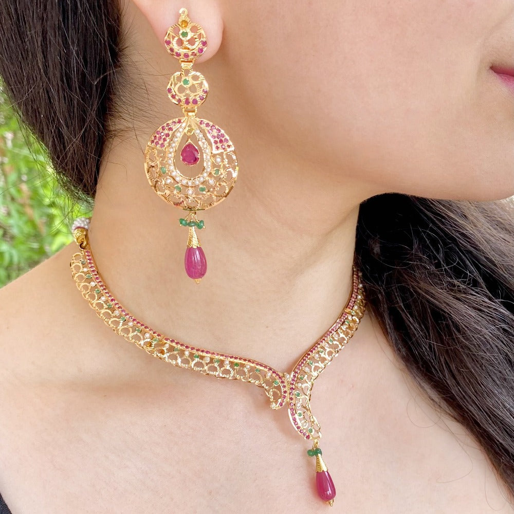 delicate gold necklace with chandbali earrings