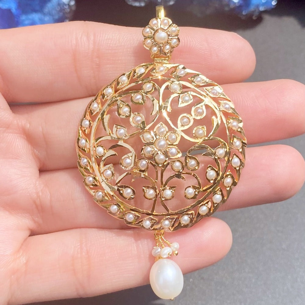 antique gold pendant studded with real pearls