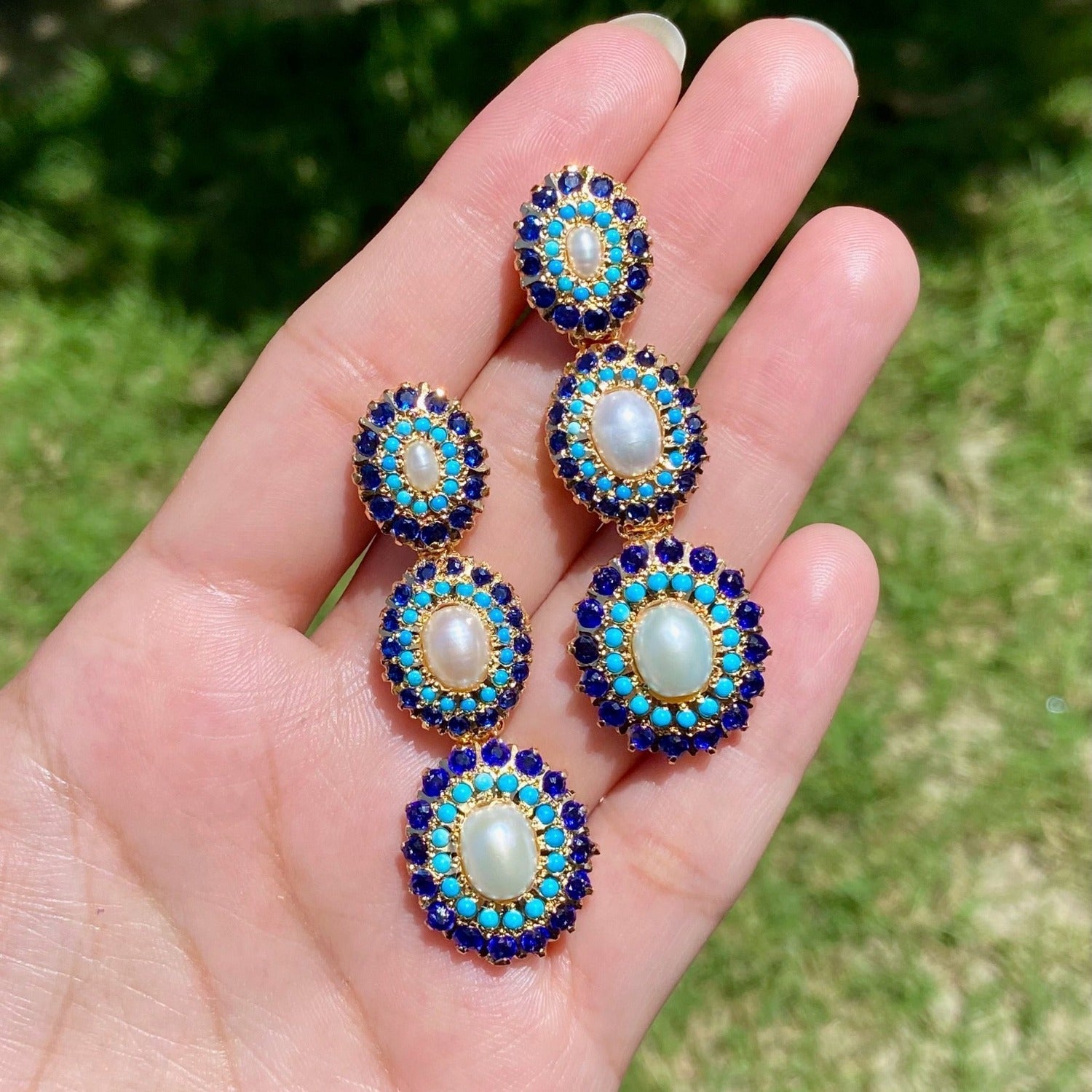 tall jadau danglers on silver studded with feroza and blue sapphire and pearls