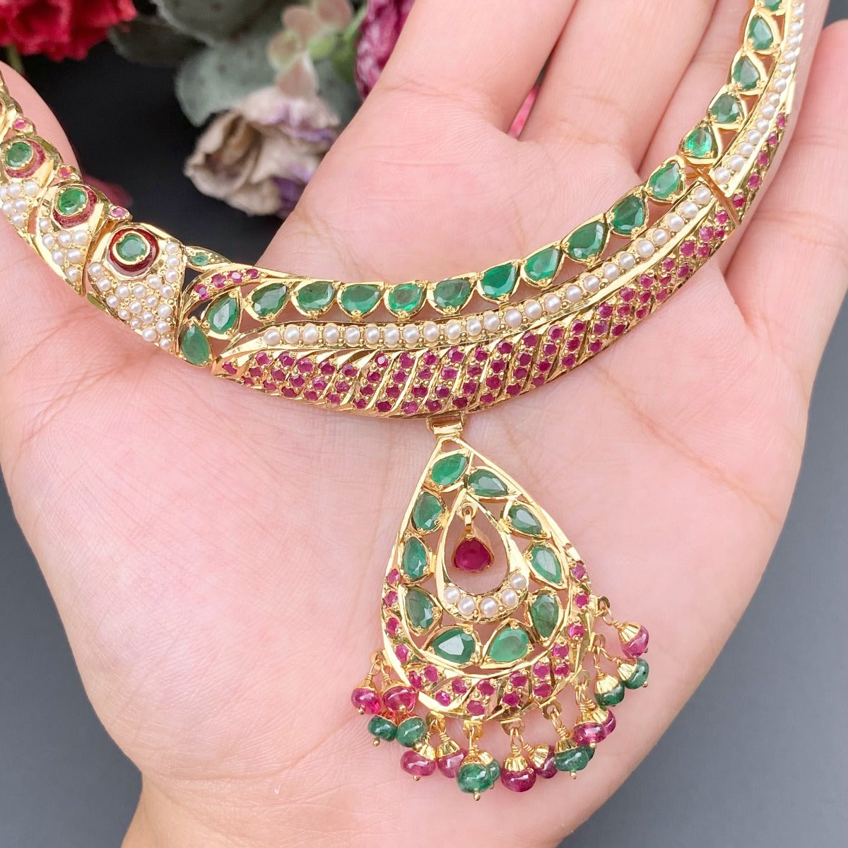 ruby emerald hasli set in gold