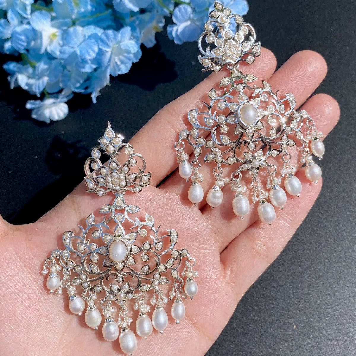 white silver earrings with pearls