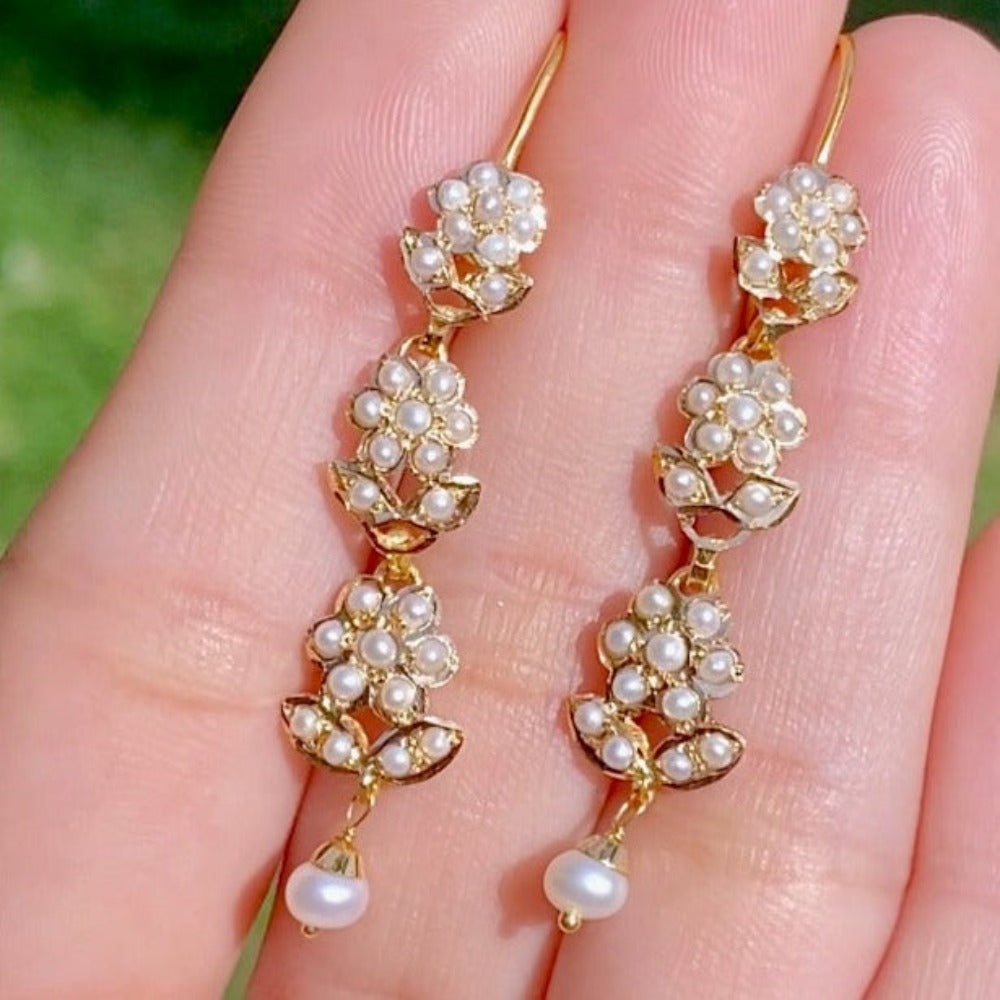 light weight gold earrings studded with pearls