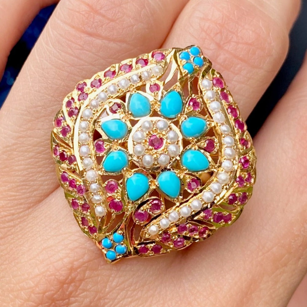 cocktail ring in 22k studded with ruby and turquoise tanishq