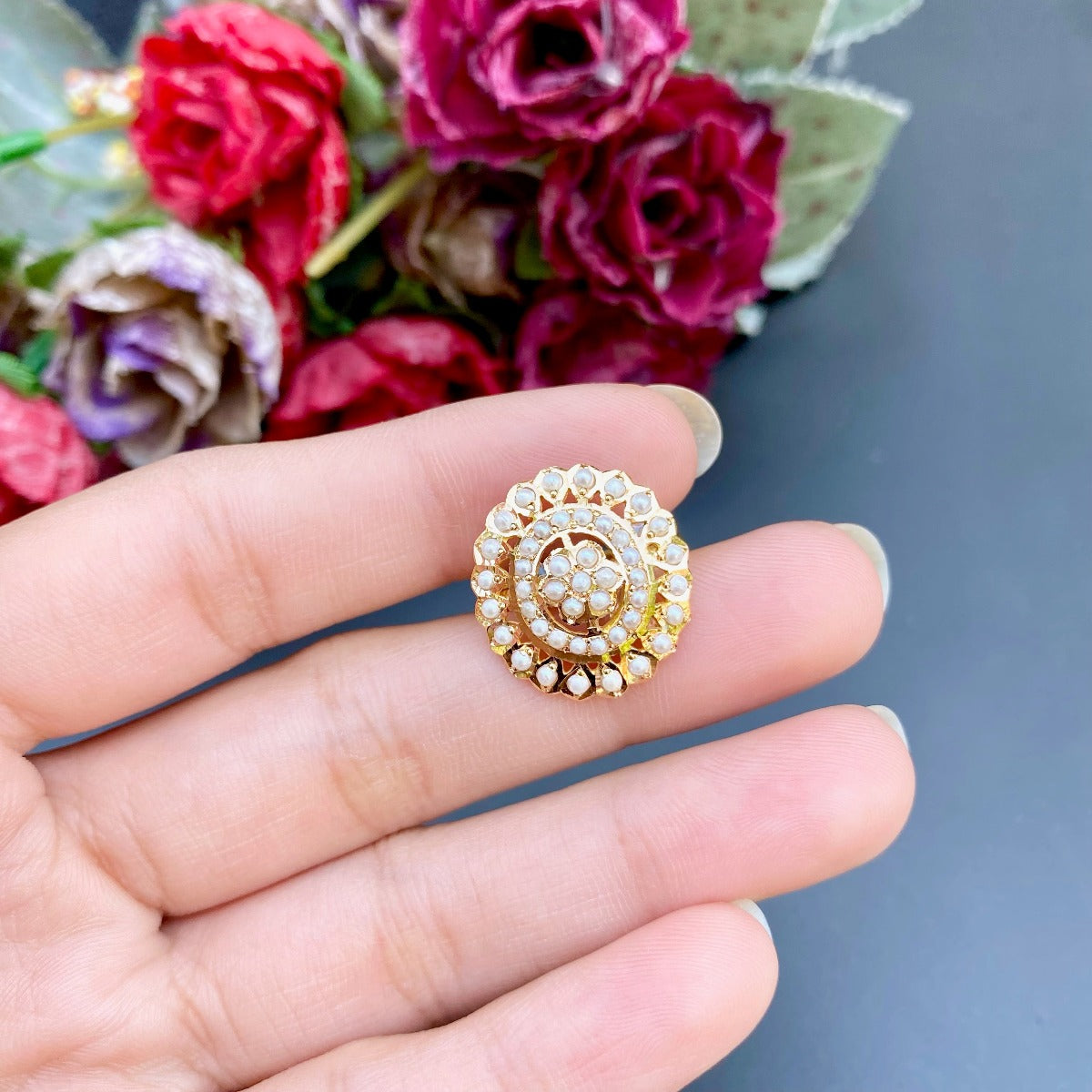 dainty gold ring oval shaped pearl studded on 22k gold