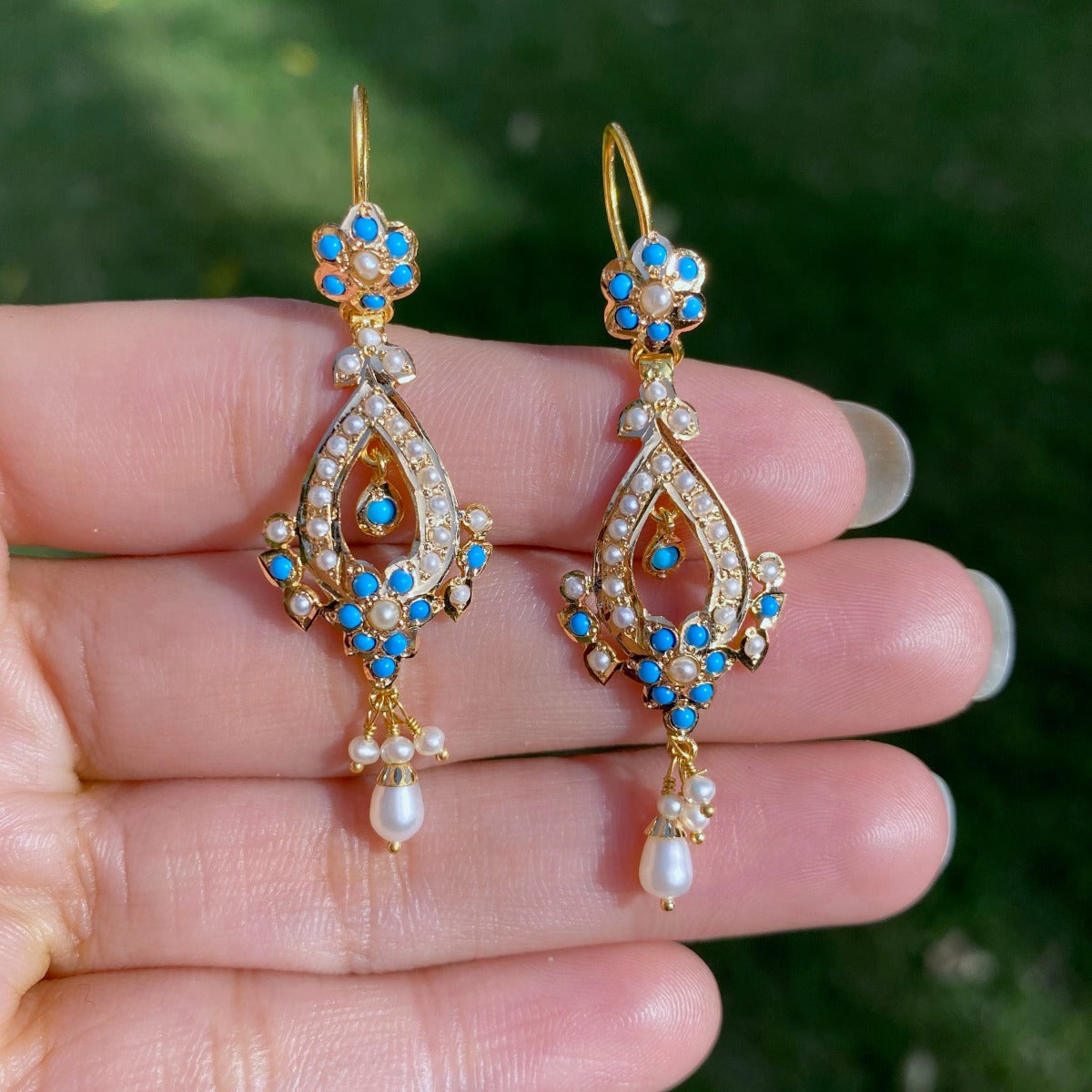 dainty gold earrings set with pearls turquoises